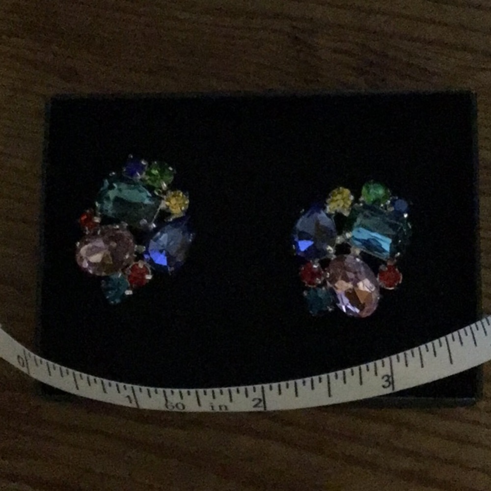 Large Avon stud earrings.